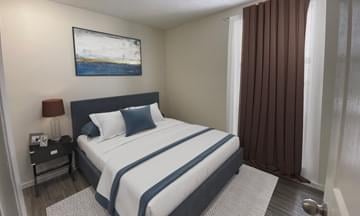 Master bedroom of 3 bedroom mews apartment at River Park Glen