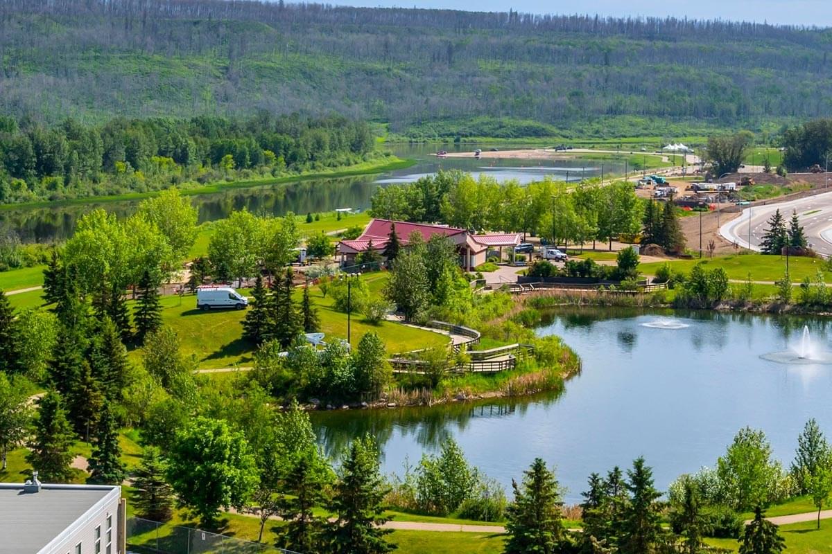 Aerial view showing nearby lake and park at Fort McMurray